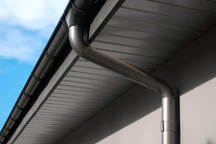Corrosion-resistant galvanized gutters installed on a commercial building in Oregon City